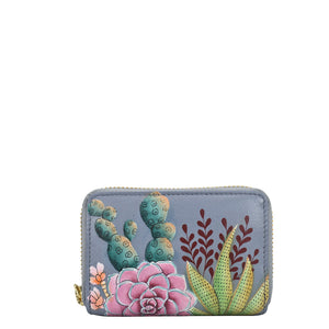 Anuschka style 1110, handpainted Accordion Style Credit And Business Card Holder. Desert Garden painting in grey color. Featuring all round zip entry to main compartment with Eleven Credit card holders.