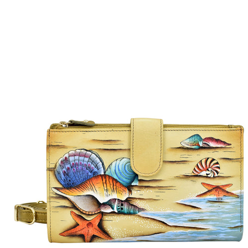 Anuschka style 1113, handpainted Cell Phone Case & Wallet. Gift of the Sea painting in Multi color. Featuring twelve credit card holders, two ID windows, two slip-in multipurpose pockets and one full length bill pocket.