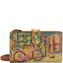 Load image into Gallery viewer, Anuschka style 1113, handpainted Cell Phone Case &amp; Wallet. Vintage Bike painting in tan color. Featuring twelve credit card holders, two ID windows, two slip-in multipurpose pockets and one full length bill pocket.

