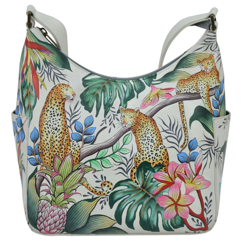 Anuschka style 382, handpainted Classic Hobo With Side Pockets. Jungle Queen painting in Ivory color. Fits Tablet and E-Reader.
