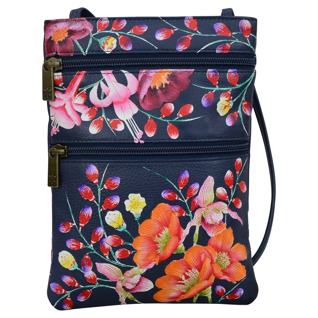 Anuschka style 448, handpainted Mini Double Zip Travel Crossbody. Moonlit Meadow Painted in Blue Color. Featuring main compartment with magnetic closure and key holder.
