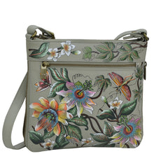 Load image into Gallery viewer, Anuschka style 550, handpainted Expandable Travel Crossbody. Floral Passion painting in Green color. Fits Tablet and E-Reader.
