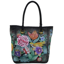 Load image into Gallery viewer, Anuschka style 609, handpainted Tall Tote With Double Handle. Vintage Bouquet Painted in Black Color. Featuring one open wall pocket, and two multipurpose pockets with removable fabric cosmetic pouch and optical case.
