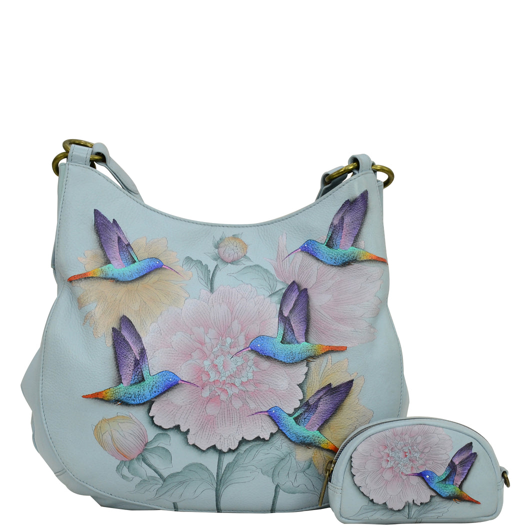 Anuschka style number 622, Shoulder Bucket Hobo. Rainbow Birds painting in white color.