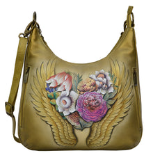 Load image into Gallery viewer, Anuschka style 662, handpainted Convertible Slim Hobo With Crossbody Strap, Angel Wings painting in tan color. Featuring  two multipurpose pockets with gusset. slip in cell pocket.
