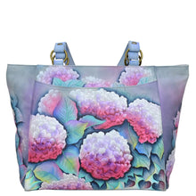 Load image into Gallery viewer, Anuschka style 664, handpainted Classic Work Tote. Hypnotic Hydrangeas Painted in Multi Color. Featuring Inside one zippered wall pocket, one open wall pocket and three multipurpose pockets with gusset.
