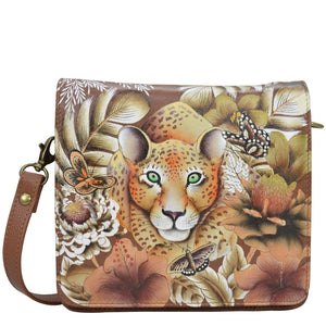 Anuschka style 669, Small Messenger. Cleopatra's Leopard painting in tan color. Featuring RFID blocking, many credit card slots and one ID window under flap.