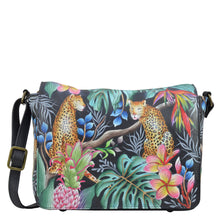 Load image into Gallery viewer, Anuschka style 683, handpainted Flap Crossbody. Jungle Queen painting in Black color. Featuring Inside zippered partition compartment and Adjustable crossbody strap.
