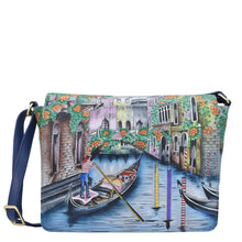 Load image into Gallery viewer, Anuschka style 683, handpainted Flap Crossbody. Venetian Story painting in Multi color. Featuring Inside zippered partition compartment and Adjustable crossbody strap.
