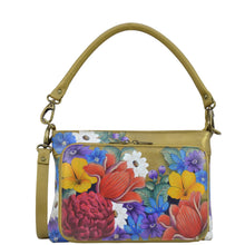 Load image into Gallery viewer, Anuschka style 684, handpainted Large RFID Organizer. Dreamy Floral painting in Gold color. Featuring front all round zippered organizer with RFID protection, ten card holders, one zippered partition pocket with removable rope handle and removable adjustable crossbody strap.
