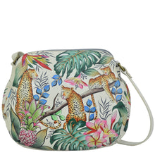 Load image into Gallery viewer, Anuschka style 691, Multi Compartment Medium Bag, Jungle Queen painting in Ivory color. Two multipurpose pockets with gusset &amp; Adjustable crossbody strap.
