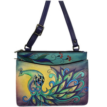 Load image into Gallery viewer, Anuschka style 7168, handpainted Multi Compartment Crossbody. Royal Peacock Eggplant painting in purple color. Featuring two zippered and one magnetic snap button entry to three compartments, Fits tablet, Fits E-Reader.
