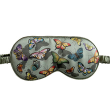Load image into Gallery viewer, Anuschka style 3302, printed 100% Silk Padded Eye Mask. Butterfly Heaven print in Green or Mint Color. Lightly padded and Comfortable elastic strap.
